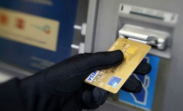 Indian debit card inserted into ATM