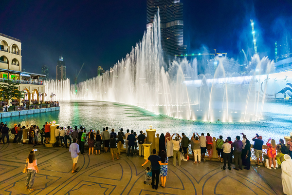 Tourists watch Dubai Fountain