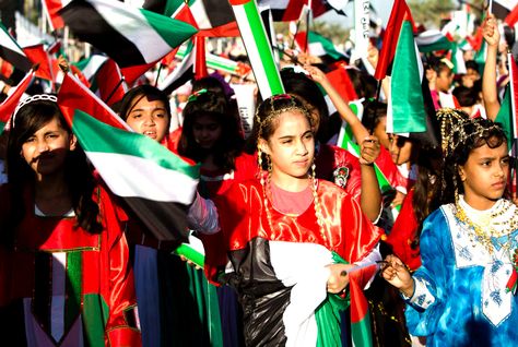 UAE Kids Waving National Falg
