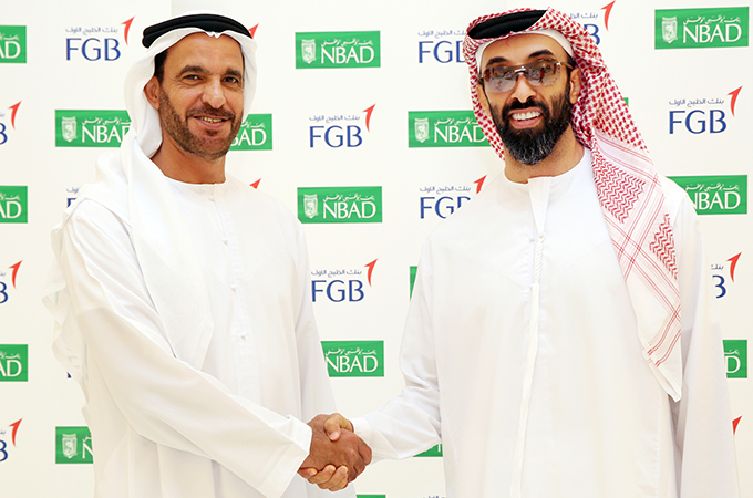 Sheikh Tahnoon and Nasser Ahmed Alsowaidi mark FGB NBAD merger