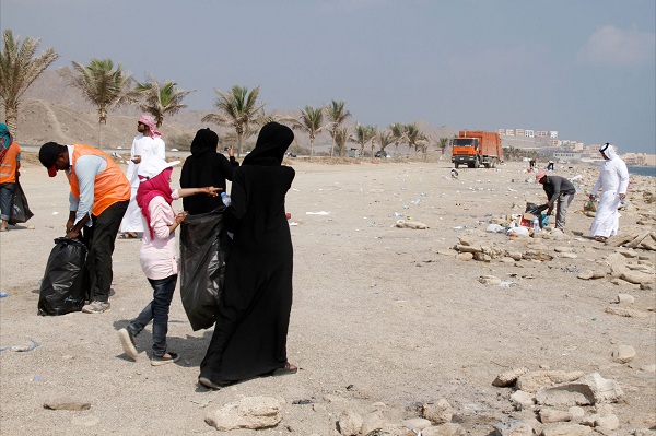 Youngters Cleaning up Beach in UAE