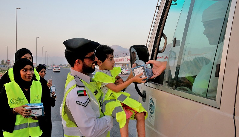 Ajman Police Distributing Iftar Meals