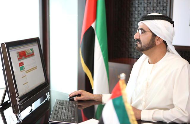 Sheikh Mohammed using a Computer